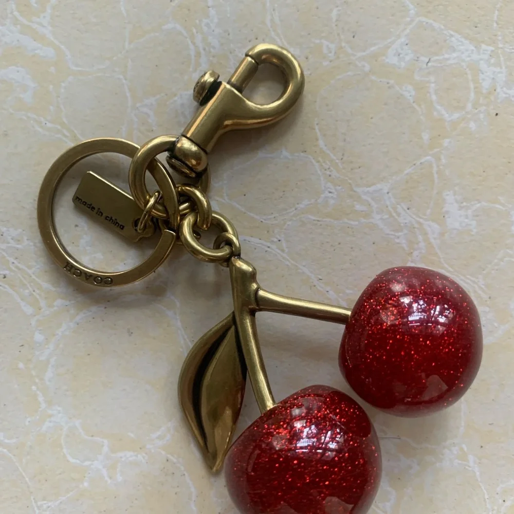 Coach Gold-Tone Keychain with Red Glitter Cherry Charm